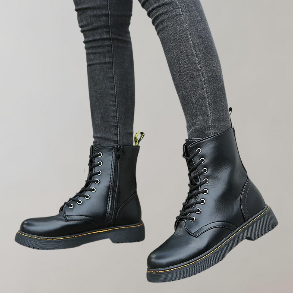 Zwarte leren dameslaars met veters, elegant design, klassiek en duurzaam, perfect voor dagelijks gebruik en speciale gelegenh