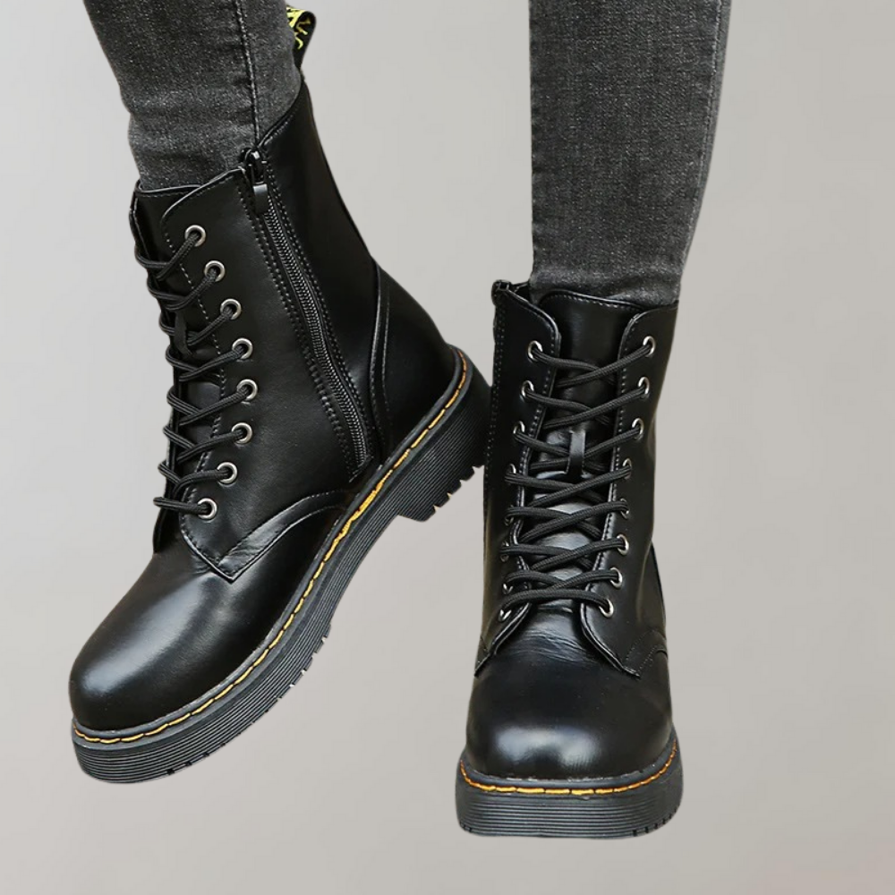 Zwarte leren dameslaars met veters, elegant design, klassiek en duurzaam, perfect voor dagelijks gebruik en speciale gelegenh